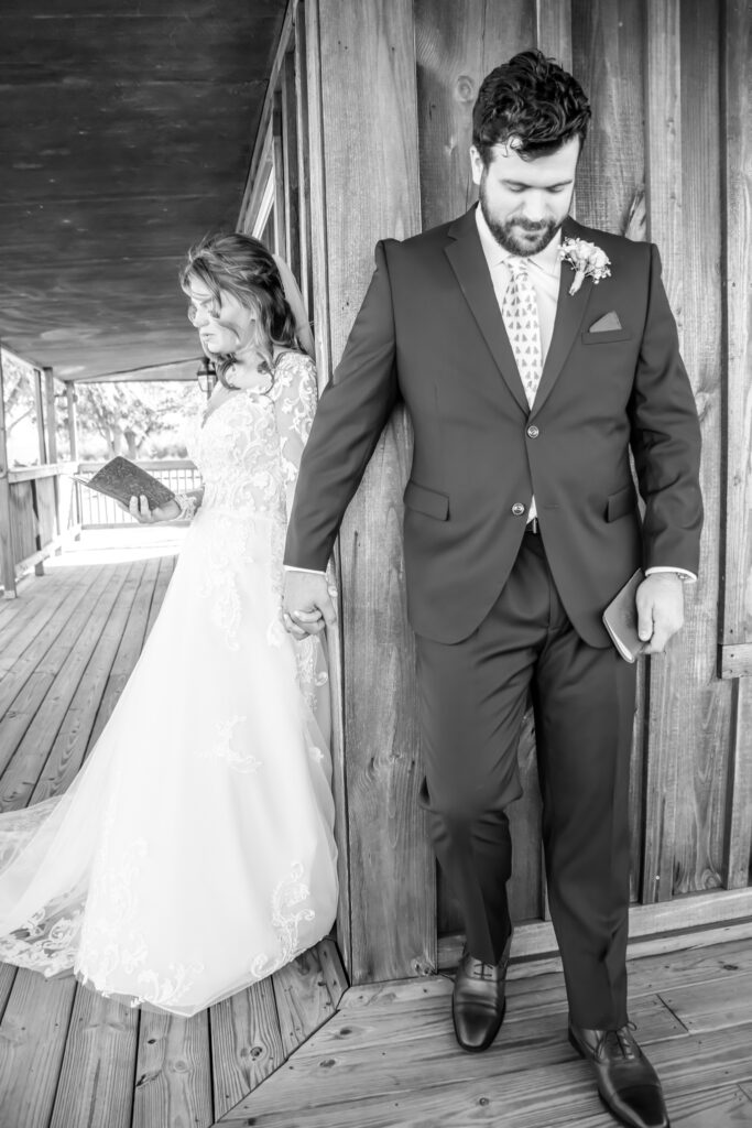 bride and groom saying their vows on the patio of a little cottage
