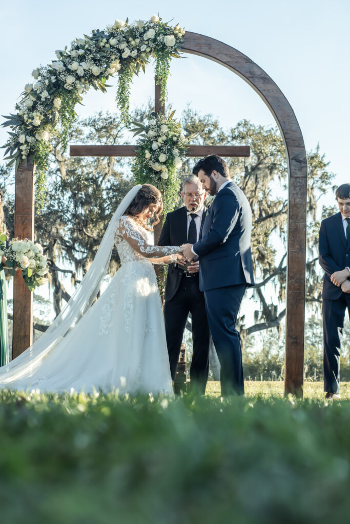 wedding ceremony in the middle of a field